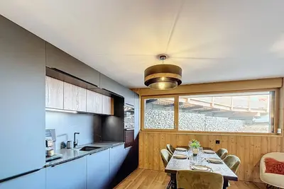 Image de Appartement d'Exception 2 Chambres, 63 m², au Pied des Pistes, Parking Inclus, Wi-Fi