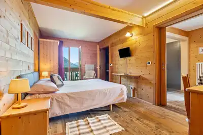 Image de Appartement 'Piccole Dolomiti' avec vue sur les montagnes, terrasse partagée et Wi-Fi