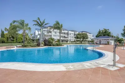 Image de Appartement 'Bahia Golf Alberto' avec piscine partagée, terrasse privée et climatisation