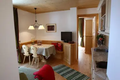Image de Appartement 'Appartamento Bilo 4 - Ombretta' avec vue sur la montagne, jardin partagé et Wi-Fi