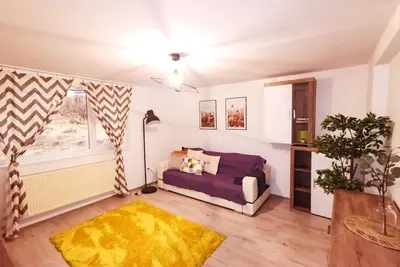 Image de Charming Mountain Apartment in Busteni, Romania