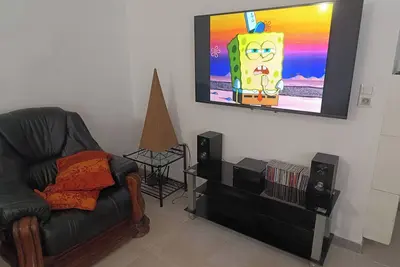 Image de chalet familial avec cour arrière