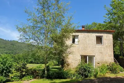 Image de Maison au-delà de la Rivière