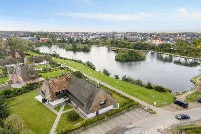 Image de Am Dorfteich - 2 Zimmer App. mit Einzigartigem Seeblick, Stellplatz, Wlan, Haustiere Erlaubt
