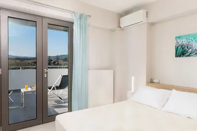 Image de Jasmine Cozy & Modern Flat, steps from Sandy Beach