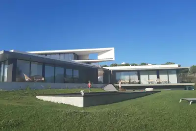 Image de Modern twin-villa with shared pool in middle of nature.