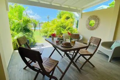 Image de Cosy Maracuja, appartement calme avec piscine et jardin à 2 min de la plage!