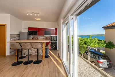 Image de Bel appartement Ă Rtina avec WiFi