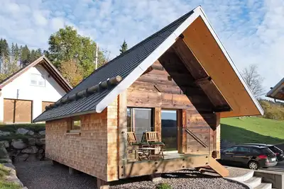 Image de Maison de vacances 'Schwarzwaldchalet Holzperle' avec terrasse privée, jardin partagé et Wi-Fi