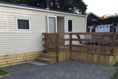 Image de Cosy chalet - Poppy Lodge in Boat of Garten, Dog Friendly, free wifi!