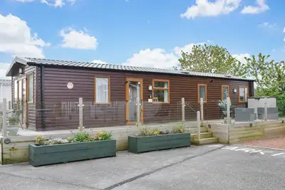Image de Escape to Cate’s Cozy Cabin, a charming three-bedroom wood cabin near Carlisle and Penrith.