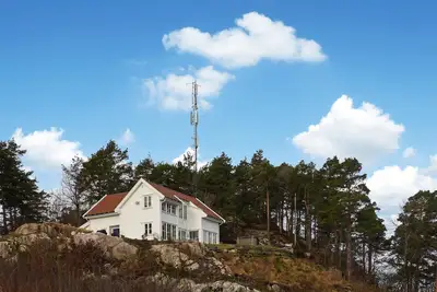 Image de Belle maison à Høvåg avec WiFi