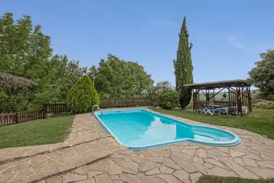 Image de Appartement \"Les Cases\" avec vue sur les montagnes, piscine privée et Wi-Fi