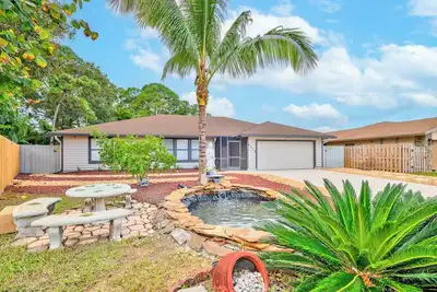 Image de Charming Lake Worth Fun House with heated pool, game room, mini golf, WiFi!