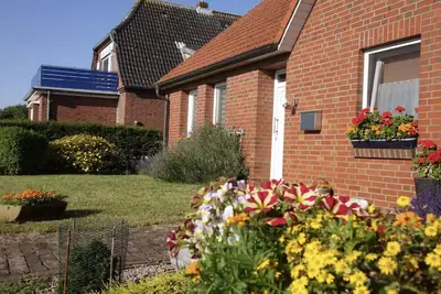 Image de Maison de vacances 'Auszeit Il Am Deich Auf Nordstrand' avec terrasse privée, jardin privé et Wi-Fi