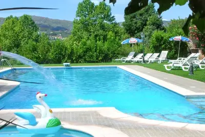 Image de Homerez - Maison confortable avec vue sur la montagne et piscine partagée