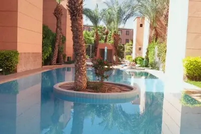 Homerez - Appartement confortable à Marrakesh avec piscine partagée.