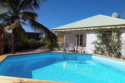 Image de Homerez - Maison chaleureuse à Le Moule avec piscine partagée