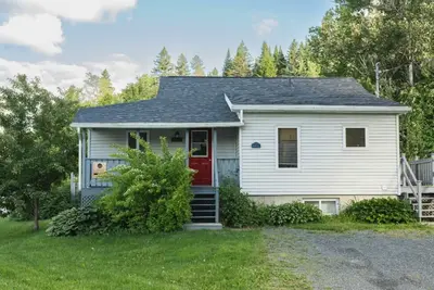 Image de Chalet du Phare avec Spa Vue sur le LAc