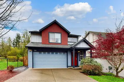 2-story home near downtown with private hot tub, streaming, firepit, deck, & W/D