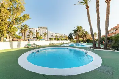Image de Appartement 'Las Buganvillas' avec piscine partagée, terrasse privée et climatisation
