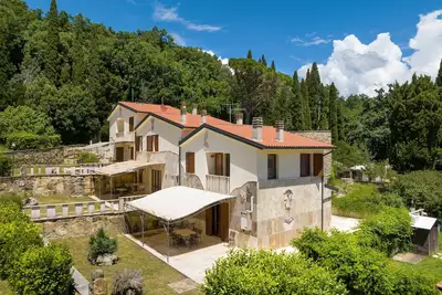 Image de Villa 'Le Querciolaie - Contessa 2' avec vue montagne et piscine partagée