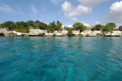 Private oceanfront vacation home on a cliff above the Caribbean Sea