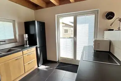 Image de Cozy vacation apartment, fully equipped 80 sqm with garden and underfloor heating