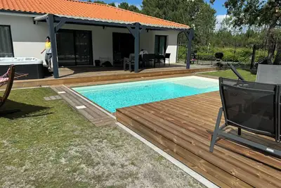 Image de Agréable maison neuve, pergola, terrasse mobile, piscine chauffée, spa 6 places