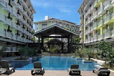 Image de Cozy Condo Near Airport with Pool and Gym