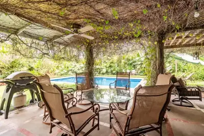 Image de 100-year old farm house with swimming pool