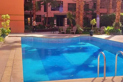 Cozy 1-bedroom apartment with pool in a prestigious district of Marrakesh.