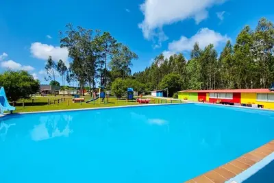 Image de Um Bungalow Aconchegante e Pergolado Proximo a Piscina e Muito Verde