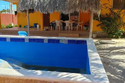 Image de Spacious Gated Beach House with a pool. Less than 150 meters from the beach