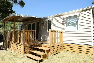 Image de Mobil home Prestige 40m² - 3 chambres + climatisation + Tv + Terrasse Couverte 8 personnes