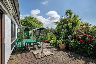 Image de Appartement \"Erdgeschosswohnung\" avec terrasse privée, jardin privé et Wi-Fi