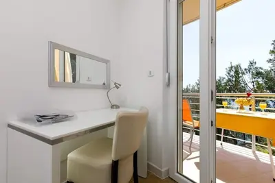 Image de Appartement confortable pour 3 adultes à côté de la plage