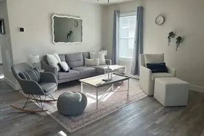 Image de Discover the perfect blend of modern living and serene nature.