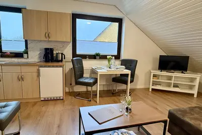 Image de Cozy apartment Lachmöwe: 48sqm for up to 5 people with terrace, close to the dike