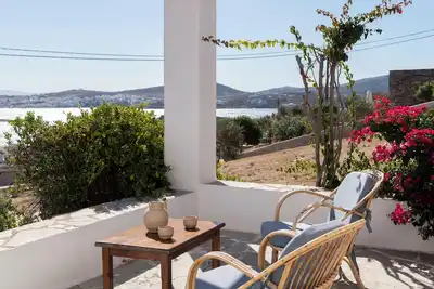 A boutique seaside apartment at Kolimbithres with a captivating patio sea view.