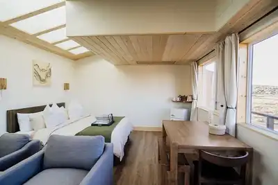 Image de Solar Powered Casita with 2 beds and a comfy seating area overlooking a peaceful desert setting