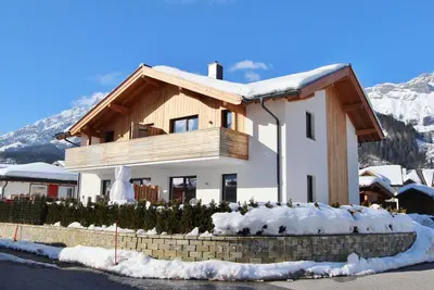 Image de Logement avec poêle à bois, sauna et jardin