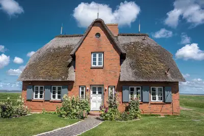 Image de Maison de vacances 'Reethuus Am Fething' avec vue sur la mer, jardin privé et Wi-Fi