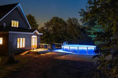 Image de Chaleureux chalet avec piscine et spa