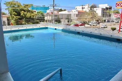 Image de Two blocks from the malecon with swimming pool by Gpsrentas