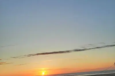 Location vacance chaleureux studio avec vu latéral sur mer