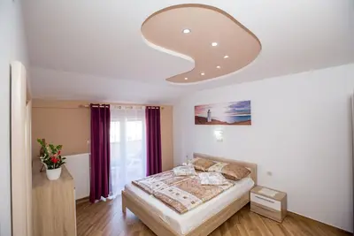 Image de Appartement d'une chambre avec le balcon et la vue sur le mer Lopar, Rab (A-23156-d)