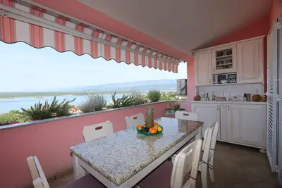 Image de Appartement de vacances avec climatisation et vue sur la mer