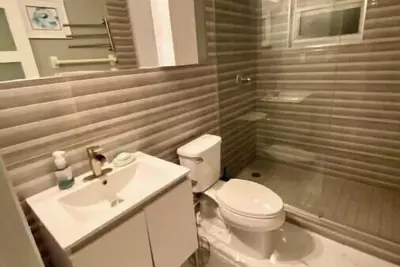 Image de Moonbay Dream- Modern, updated condo with private beachfront access!