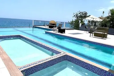 Image de 7 B/R Oceanfront Villa w/ Jacuzzi, Butler and Chef